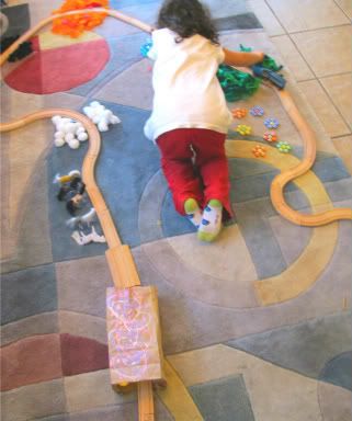 playing with toy train tracks in a new way