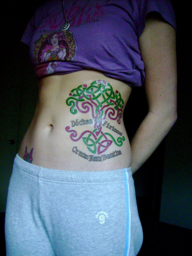 tattoo on belly after pregnancy. I have a large tattoo on my