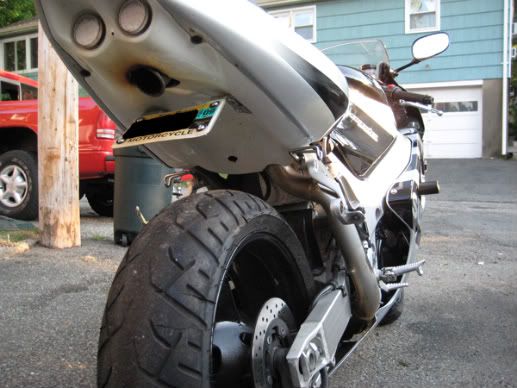 motorcycle with exhaust under seat