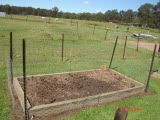 fenced off veggie garden